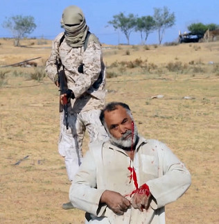 New ISIS Video Shows Crouching Man Executed By AK47