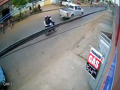 CCTV crash. Motorcyclist rolls up boy  