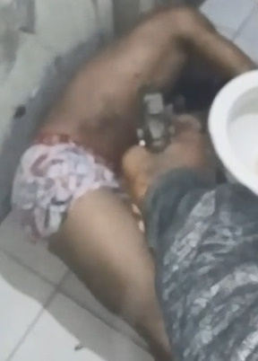 Already Wounded Man is Executed by Pistol in the Bathroom