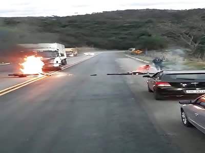 Motorcyclist on fire.. He's rescued 
