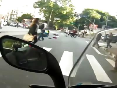 Motorcyclist smashes into pedestrian.