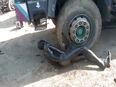 Happy ending, thief with hands under a truck wheel as punishment.