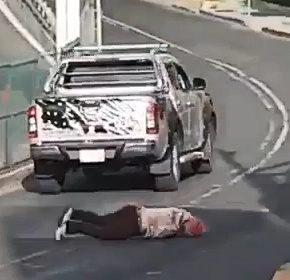 Woman knocked down by crazy driver.