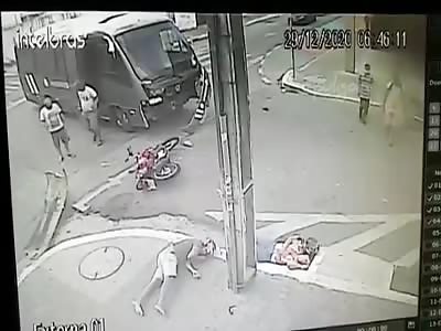 CCTV. Accident car vs motorcyclist {Aftermath}