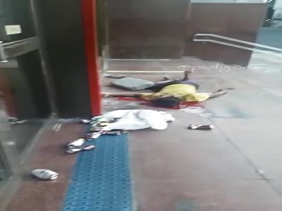 man killed at the bank door in Brazil by stones