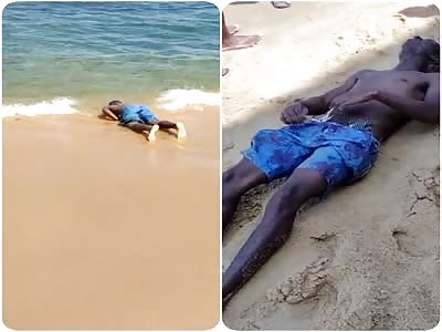 WTF. lifeless man on the seashore 