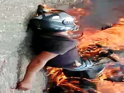 as viewers watch two motorcyclists burn alive