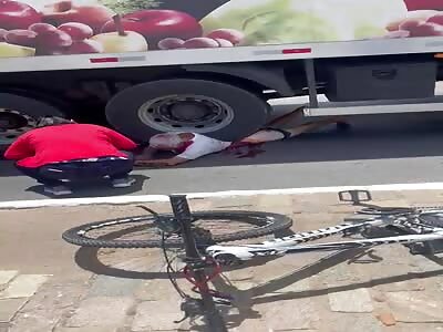 brutal accident where cyclist is crushed by truck