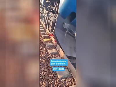 MAN STILL ALIVE UNDER THE TRAIN WHEELS