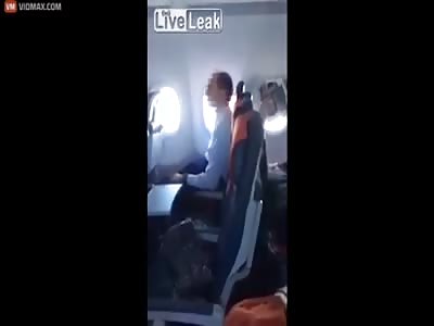  Wtf !! Guy is jerking off right on the plane and gets caught 