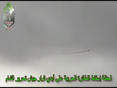 SYRIAN REBELS SHOOT DOWN FIGHTER JET WITH AA GUNS 