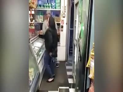 Crazy woman pees on the floor in a convience store