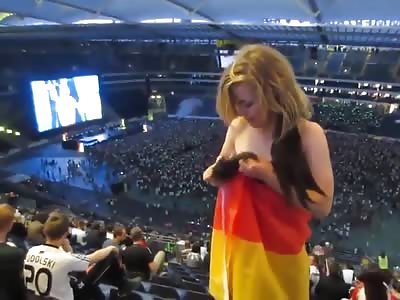 German Girl flashes during public viewing
