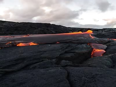 Timelapse view of lava moving on the plains near Puâ€™u Oâ€™o, Hawaii.