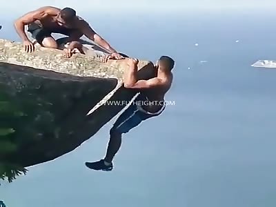 Guy Almost Fall To His Death After Trying To Pose For An Off The Cliff ...