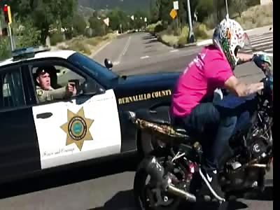 Deputy Pulls Gun On Motorcyclist While Driving...