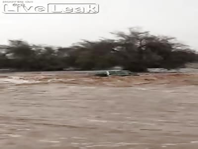 Stupid driver  trying to cross flooded river