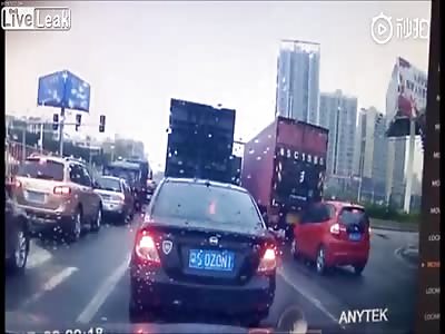 Small red car squished