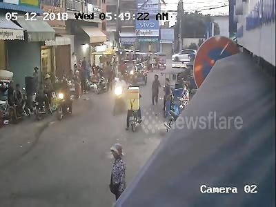 Furious locals karate  kick phone thieves off their getaway bike