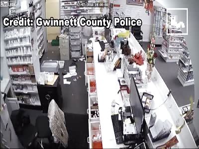 Employee dragged, held at gunpoint during armed robbery