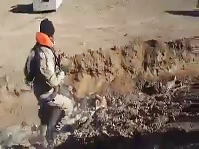 Daesh soldiers being slaughtered in a ditch