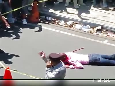(  Two angles) thief dying drinking his own blood after being shot in the head of a guard