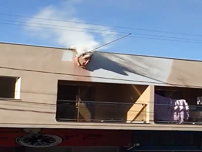 Man electrocuted on top of a building frying