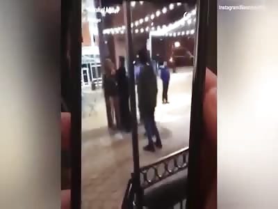 Woman takes a punch from a policeman and throws her to the ground