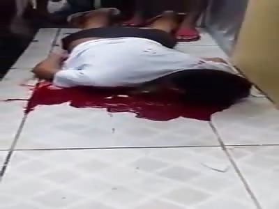 Boy dying in a puddle of his own blood