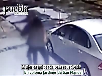 woman beating by thief