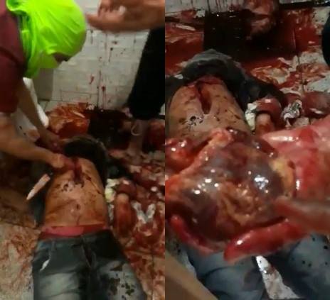 HUMAN BUTCHERY: Shocking Video Shows young rival being chopped and ripped out his heart (heart beating outside the body)