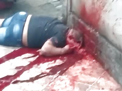 man brutally murdered in favela ,face destroyed with shot rifle