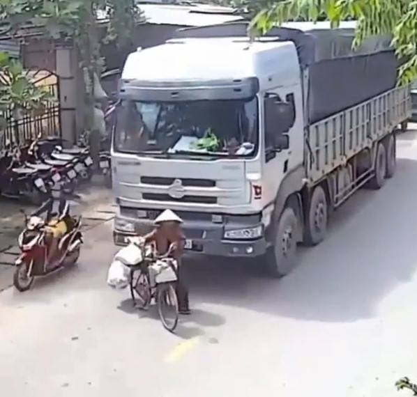 Elderly woman Head destroyed by giant truck 