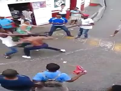 boy knocked out in a street boxing match