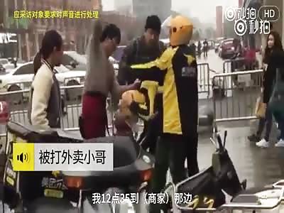 biker gets a beating for seating a box of rice