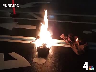 Anti-Trump protester LIGHTS himself on fire in front of Trump Hotel
