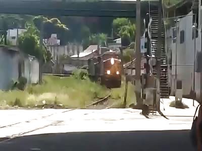 lucky man recorded the moment when a car is hit by a train
