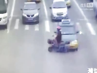 electric motorbike driver loses her head