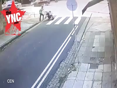  mother pushing pram is hit by a car on zebra crossing
