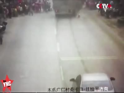 a man drives  his truck into lots school children 