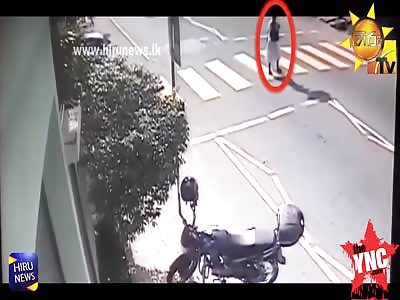 old woman run over when walking along a zebra crossing