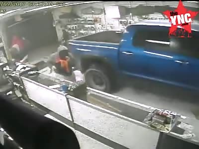 see how Florida gangsters  Drive A Stolen Toyota Tundra Into A Gun Shop
