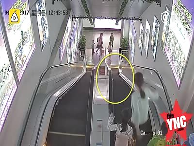 a two-year-old boy gets his hand stuck in a escalator