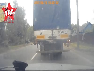 Russian  alcoholic woman gets crushed under a lorry 