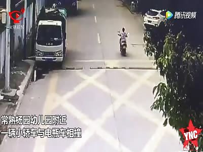 woman gets crushed into a wall by a woman driver