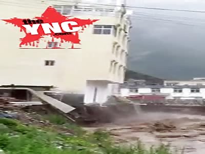 High-rise building fallen into a river in Tibet 