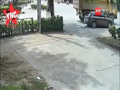motorcycle man  get crushed under a truck  