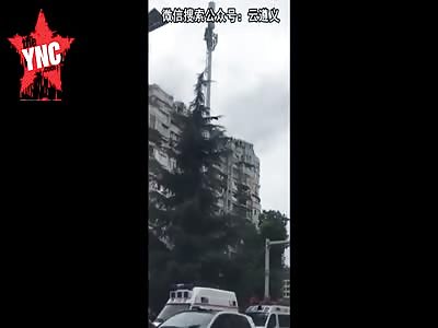man jumps of a mobile phone tower