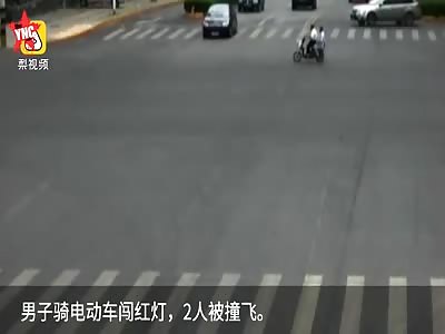  electric car people running a red light, both were hit then fly
