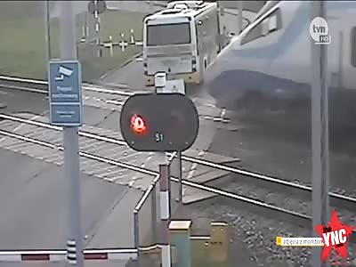 worst bus driver in the world lets his bus get crushed by a train in poland